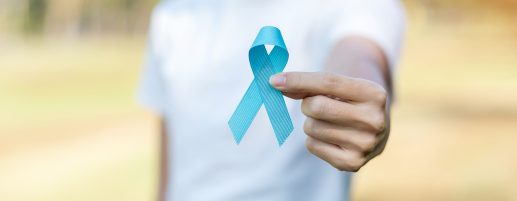 November Prostate Cancer Awareness month, woman holding Blue Ribbon for supporting people living and illness. Healthcare, International men, Father, World cancer day and world diabetes day concept